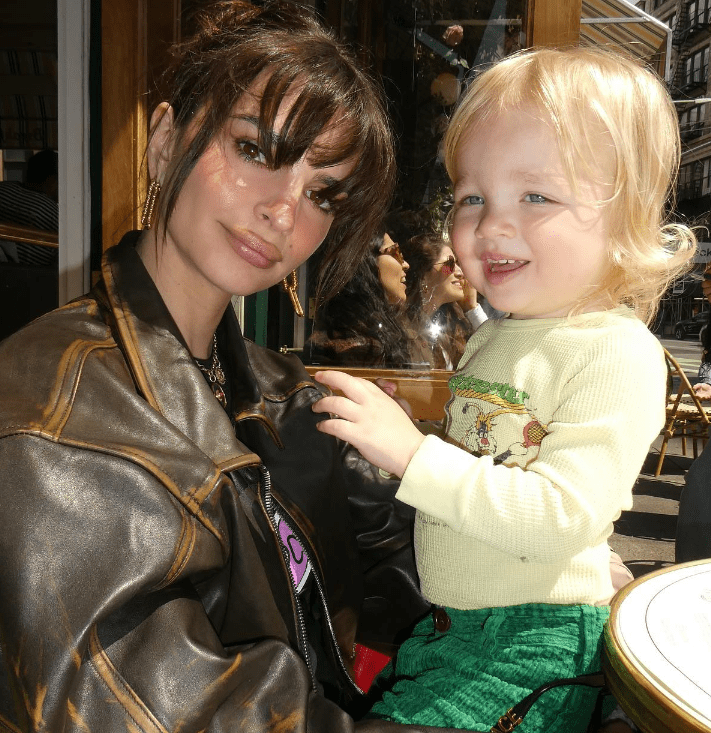 Emily Ratajkowski with her child