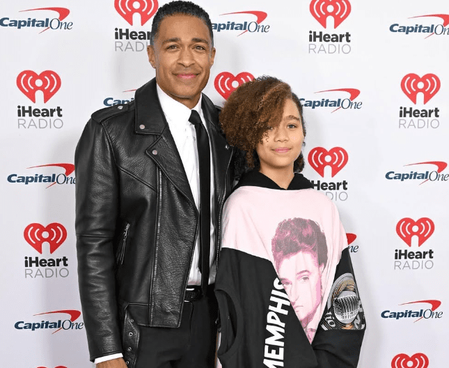 T. J. Holmes with his Daughter