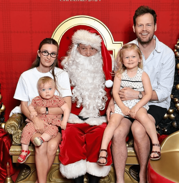 Tom Steinfort with his wife, kids and Santa Caluse