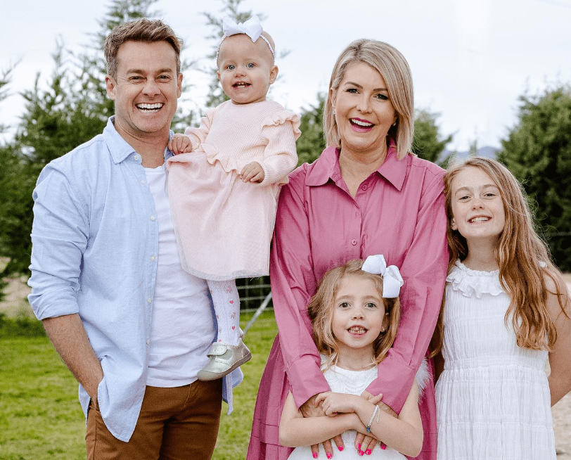Grant Denyer with his wife and Daughters